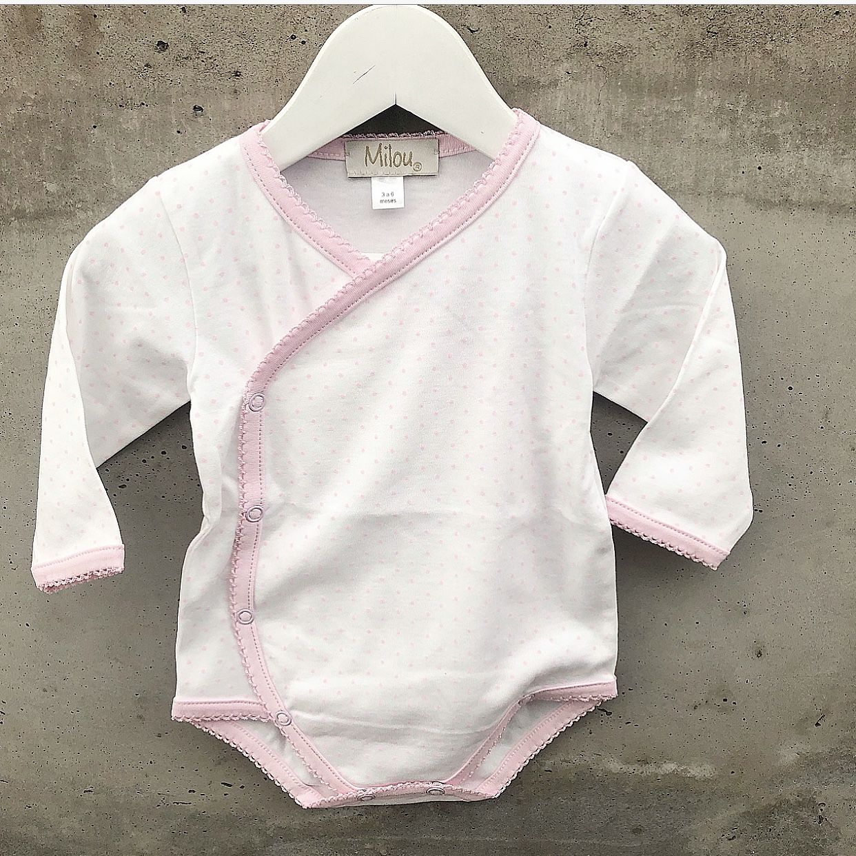 Body puntitos rosa