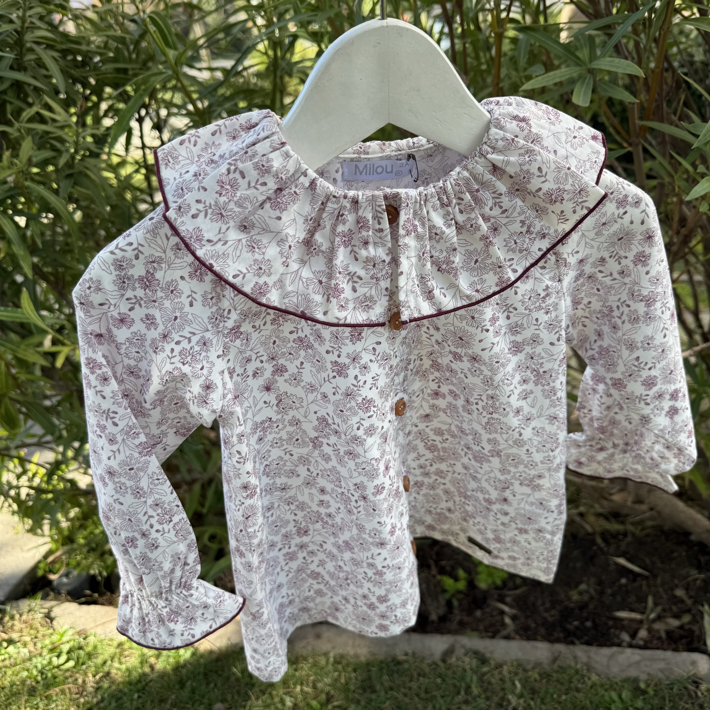 Blusa flores burdeo