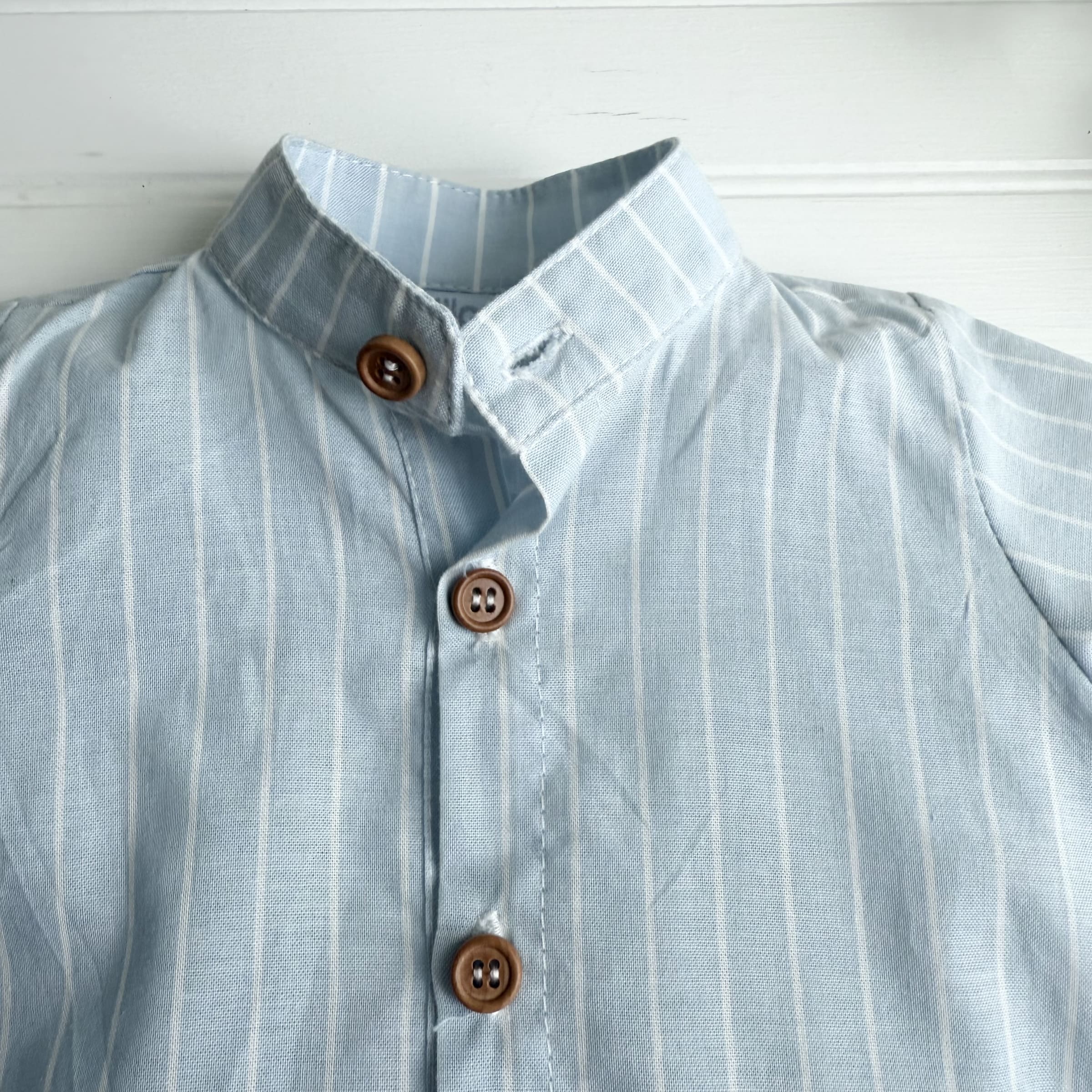 Camisa rallas celeste m/c