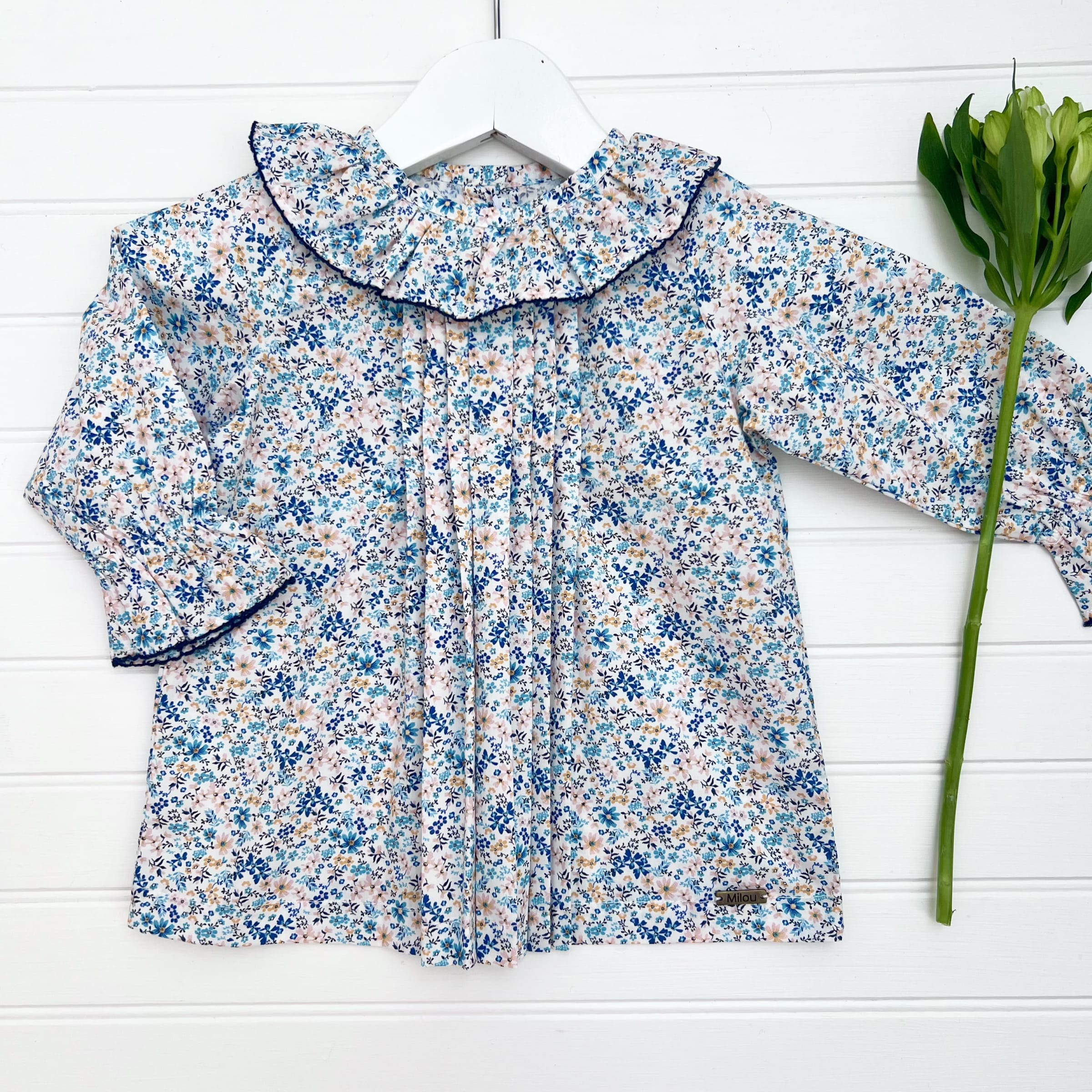 Blusa payaso flor azul