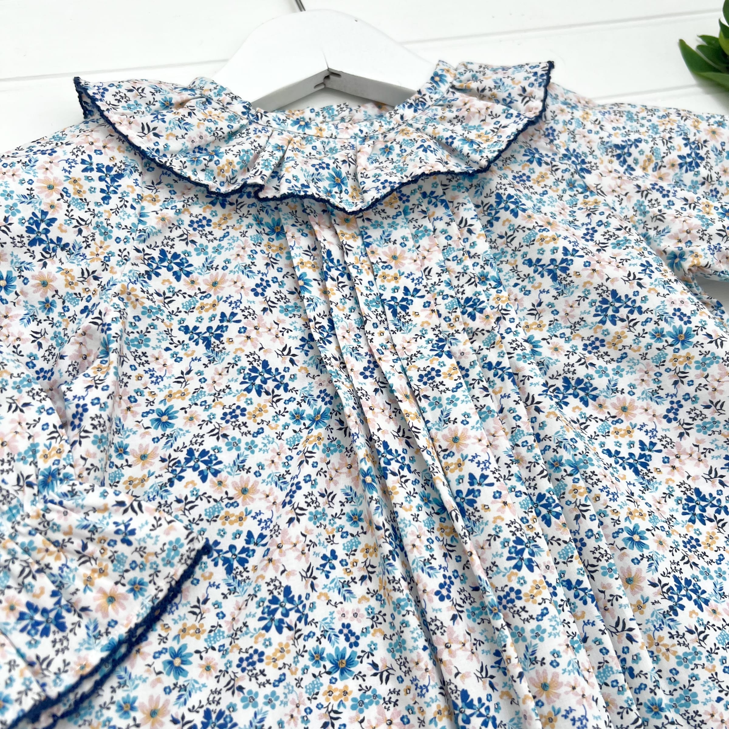 Blusa payaso flor azul