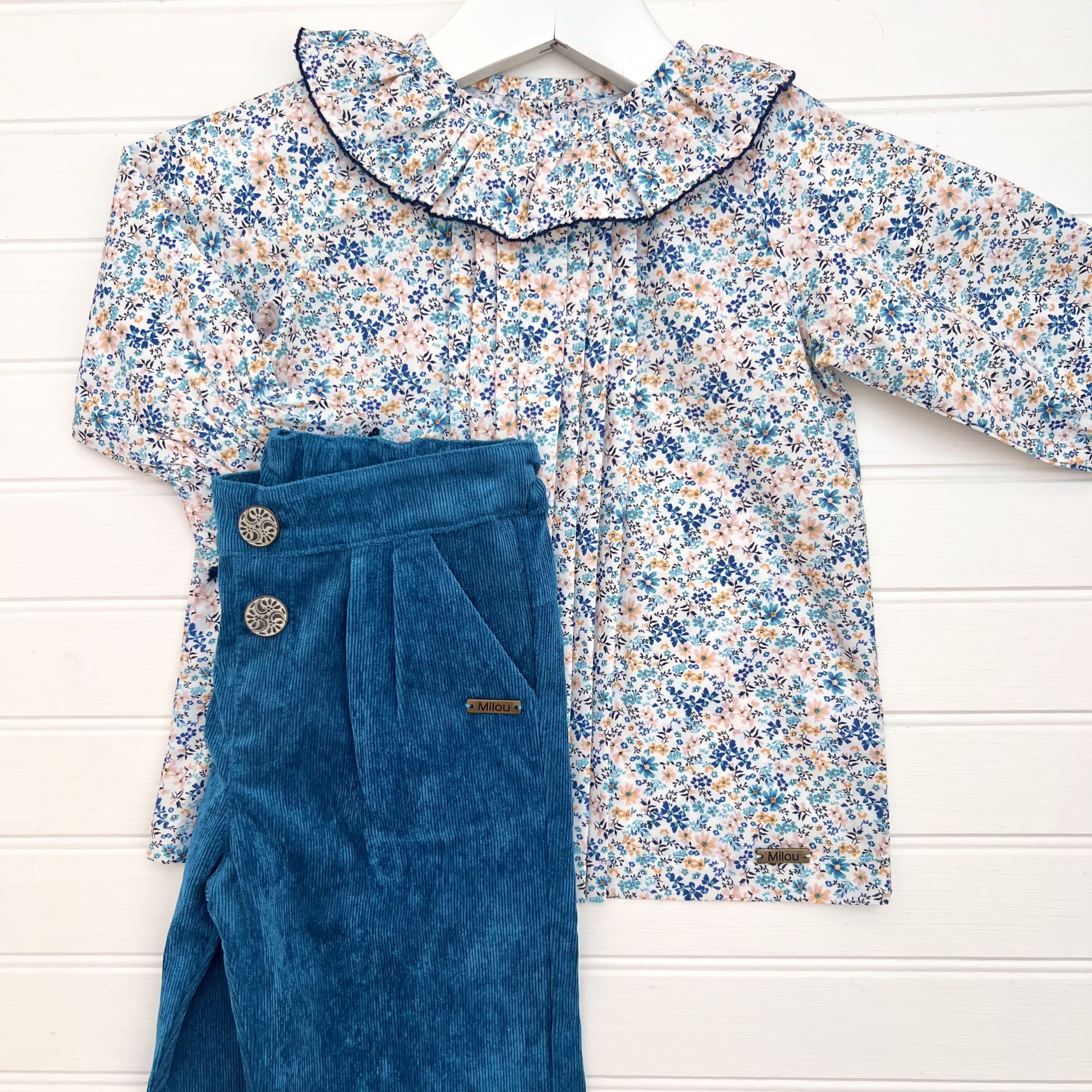 Blusa payaso flor azul