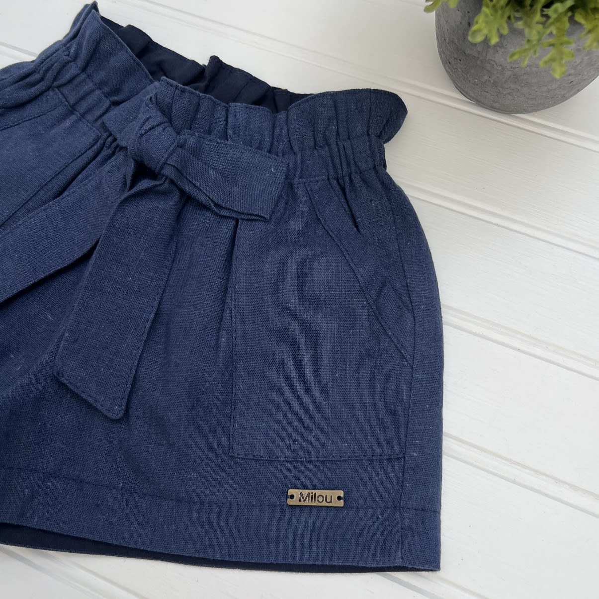 Short niña lazo lino azul