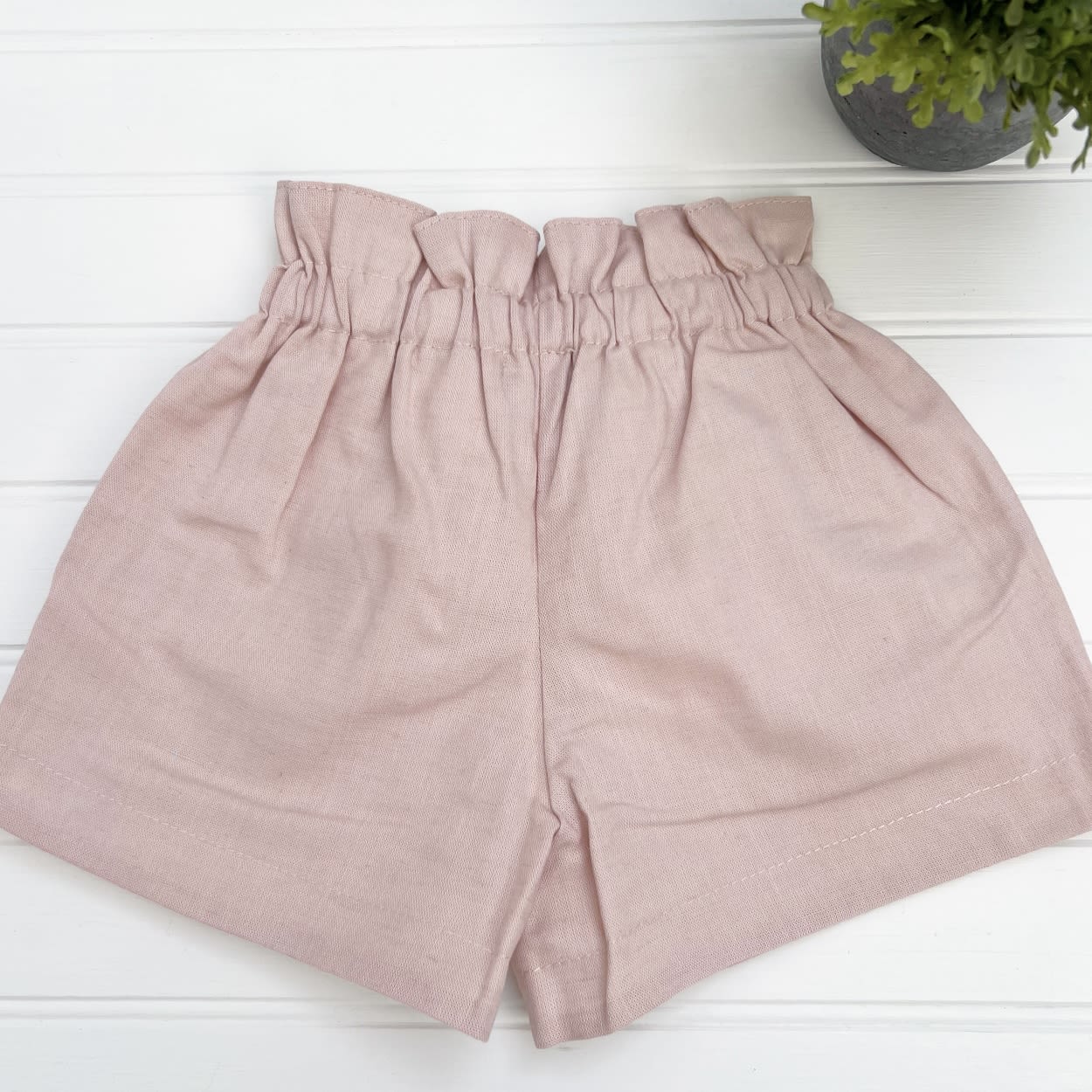 Short niña lazo lino rosa