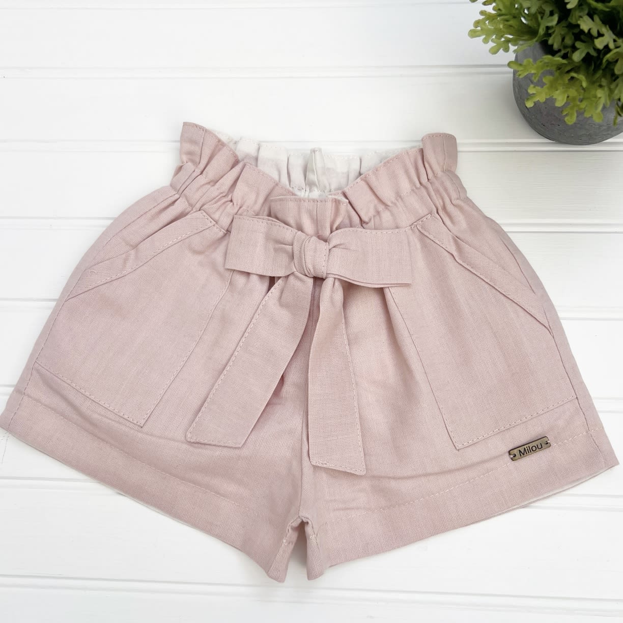 Short niña lazo lino rosa